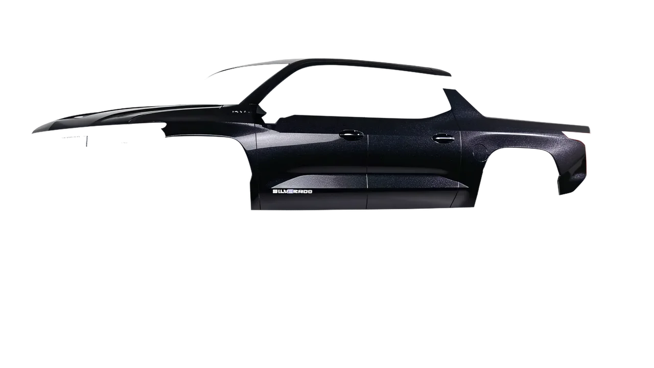 Chevrolet Silverado EV WT 2024 wrapped in Mystery Black (Avery Dennison SW900-184-M), front three-quarter view