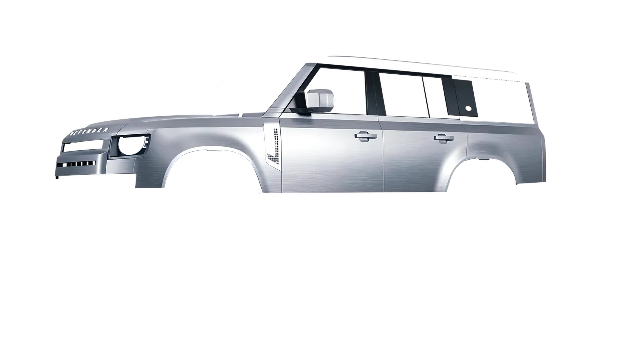 Land Rover Defender 130 2023 wrapped in Brushed Aluminum (Avery Dennison SW900-812-X), front three-quarter view