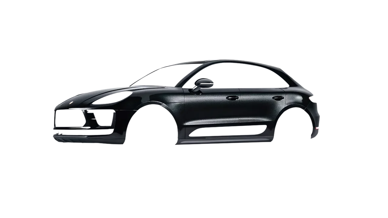 Porsche Macan Turbo 2023 wrapped in Mystery Black (Avery Dennison SW900-184-M), front three-quarter view