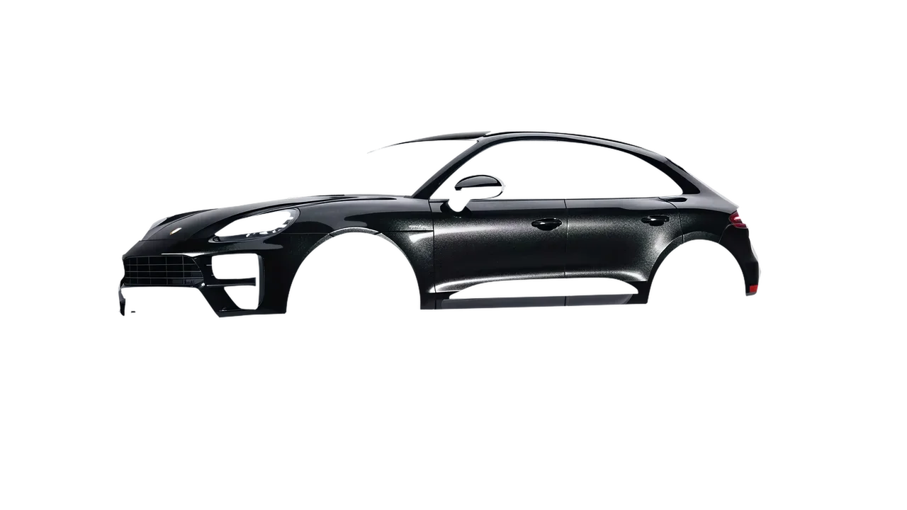 Porsche Macan Turbo Electric 2024 wrapped in Mystery Black (Avery Dennison SW900-184-M), front three-quarter view