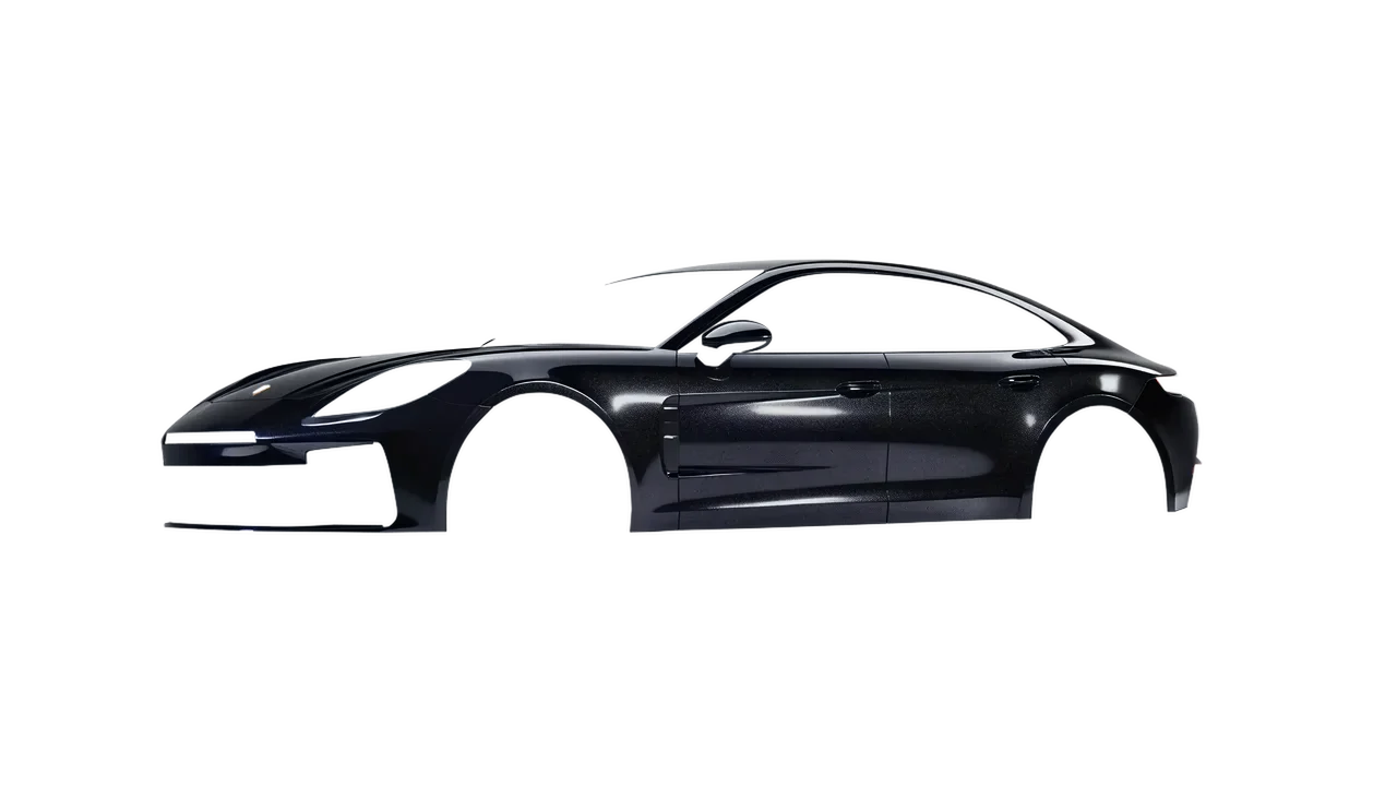 Porsche Panamera 2024 wrapped in Mystery Black (Avery Dennison SW900-184-M), front three-quarter view
