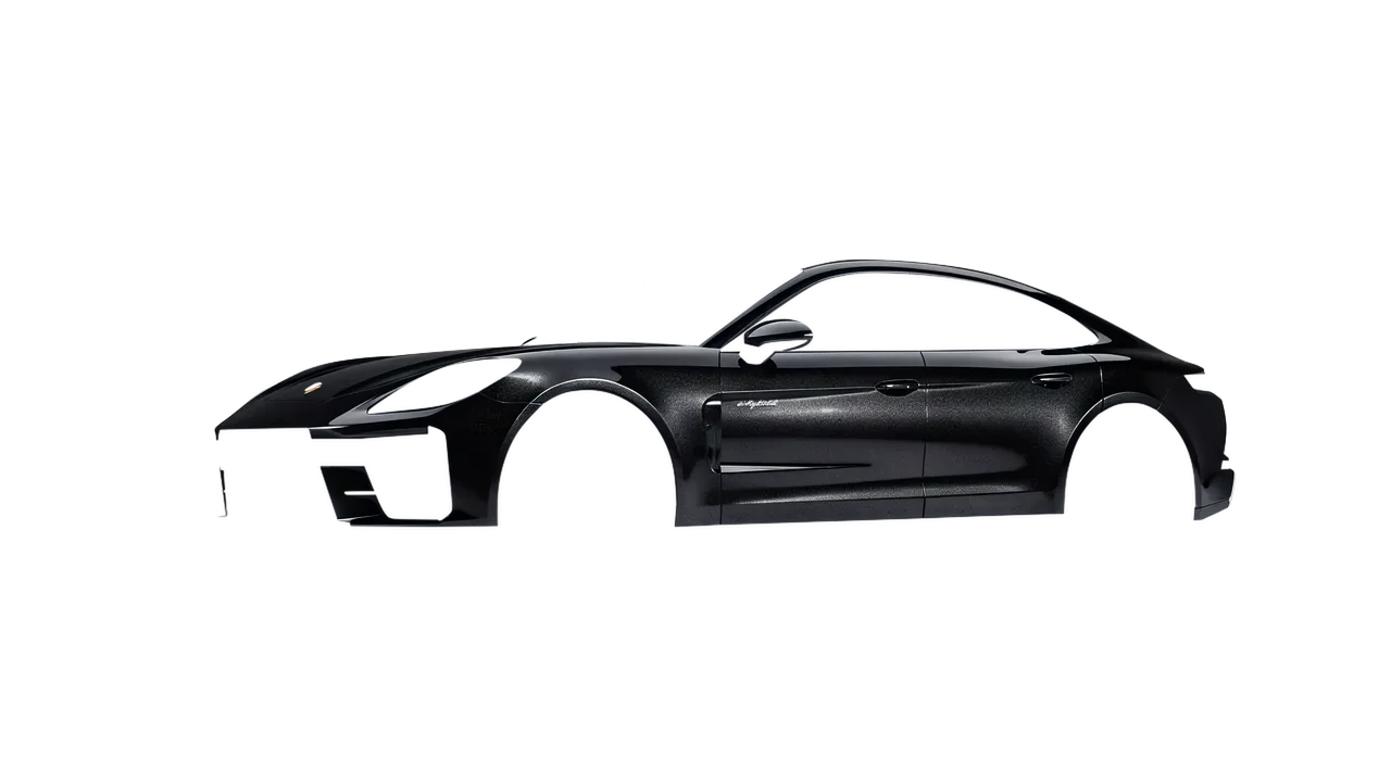 Porsche Panamera Turbo 2024 wrapped in Mystery Black (Avery Dennison SW900-184-M), front three-quarter view