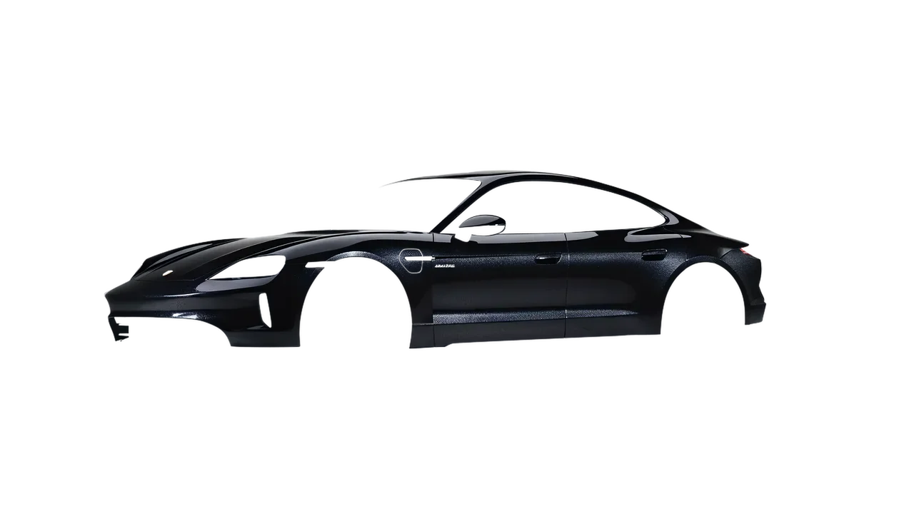 Porsche Taycan 2024 wrapped in Mystery Black (Avery Dennison SW900-184-M), front three-quarter view