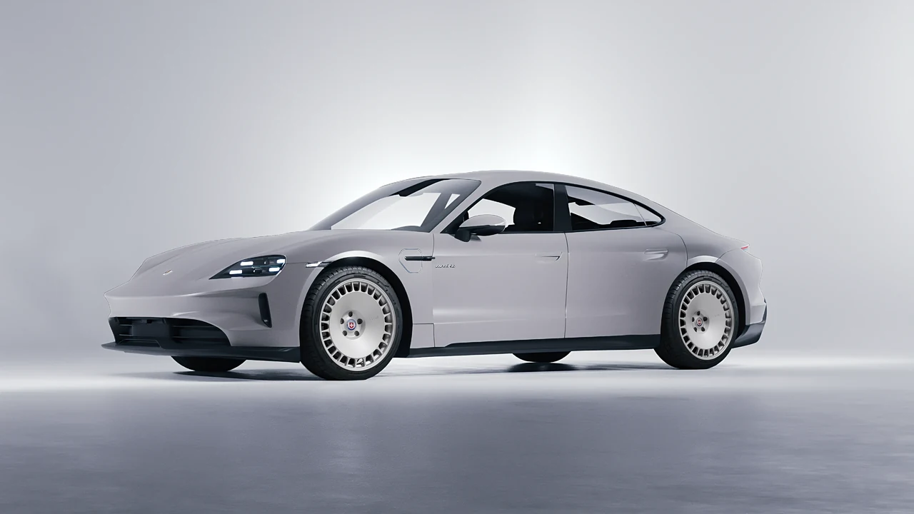 Porsche Taycan 2024 on HRE Performance Wheels 935M forged wheels, front three-quarter view
