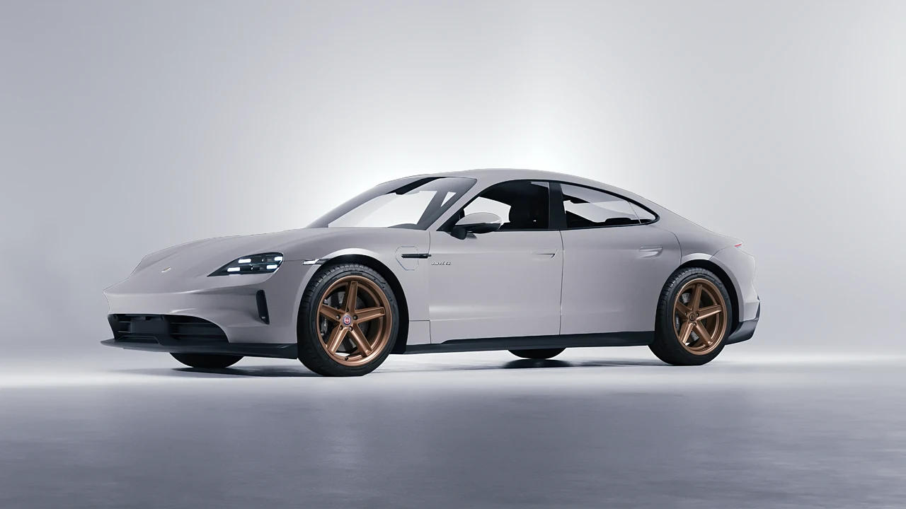Porsche Taycan 2024 on HRE Performance Wheels Tusk forged wheels, front three-quarter view