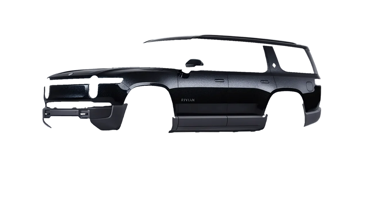 Rivian R1S 2025 wrapped in Mystery Black (Avery Dennison SW900-184-M), front three-quarter view