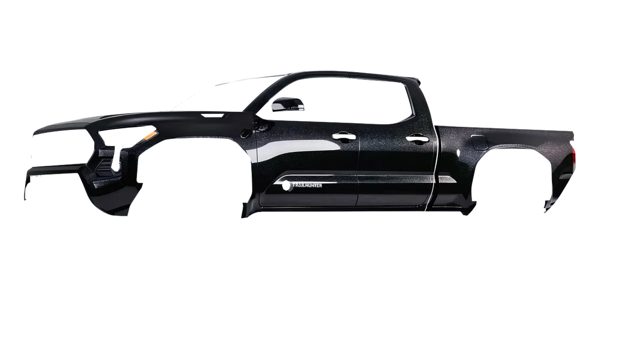 Toyota Tacoma Trailhunter 2024 wrapped in Mystery Black (Avery Dennison SW900-184-M), front three-quarter view